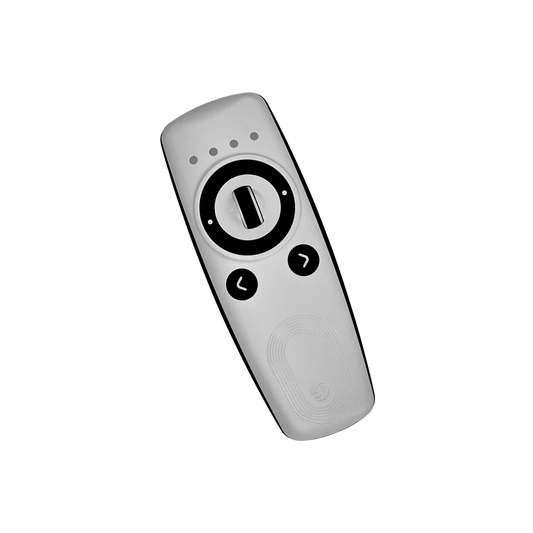 White remote control with black buttons on a white background | Lykalyte