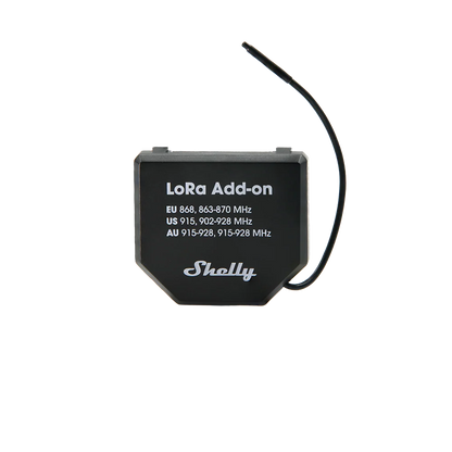 A black LoRa Add-on module with a thin black wire extending from the top right, featuring white text that reads 'LoRa Add-on' and 'Shelly' on a plain white background. | Lykalyte